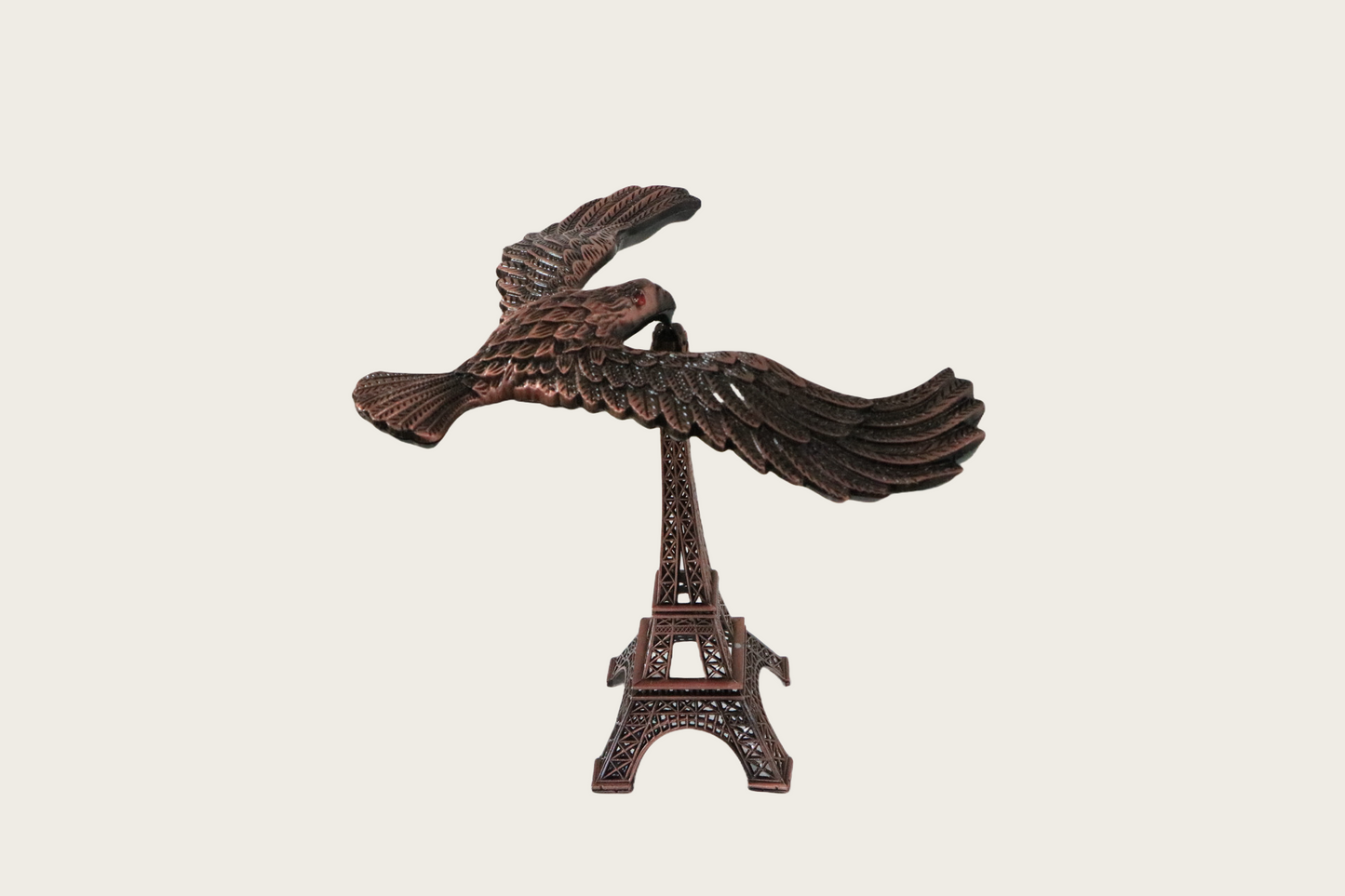 Majestic Eagle on Eiffel Tower Sculpture